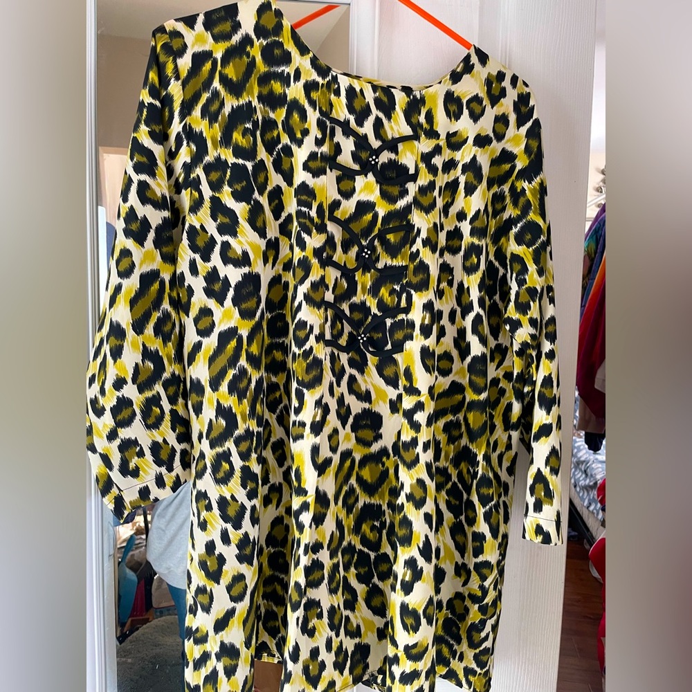 Leopard print top no tags. Ox Embellished with ribbon &rhinestones. polyester.